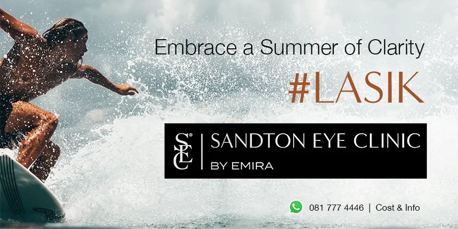 A surfer riding a wave, symbolising the summer of clarity and freedom you can experience after LASIK.